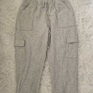 Grey sweatpants with many pockets